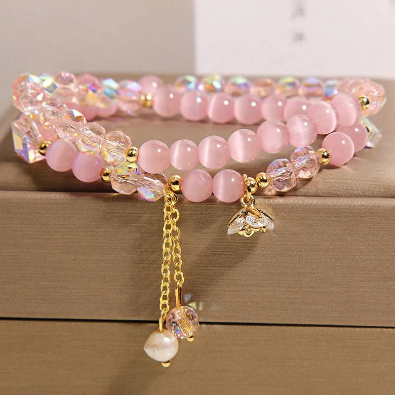 New Chinese style gold-plated double ring bracelet with pink cat eye crystal and zircon small flower detail