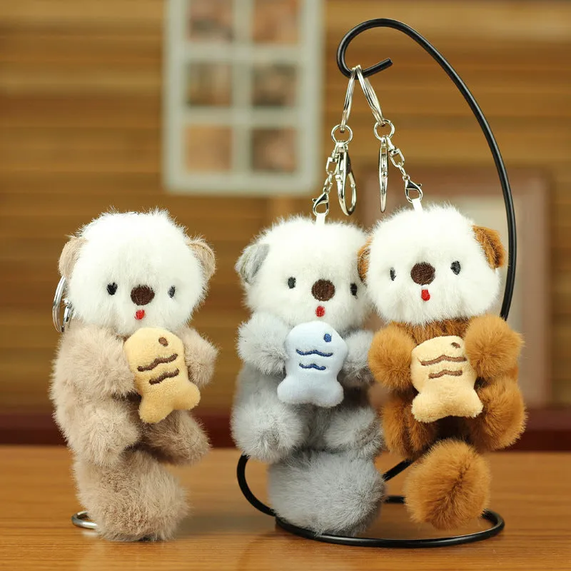 Cute sea otter pendant plush toy keychain with dark brown, light brown, and gray options