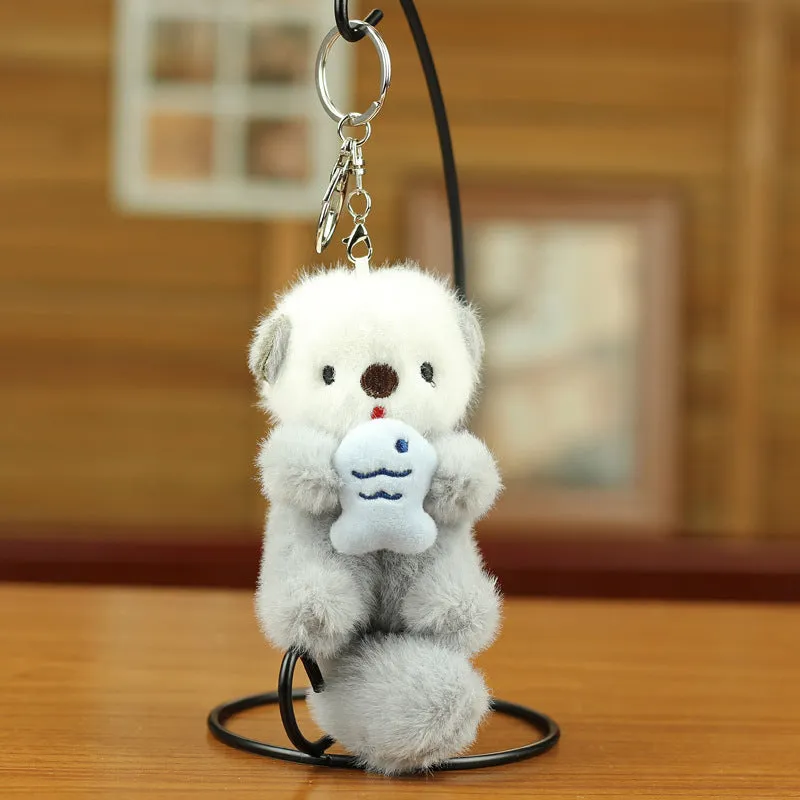 Cute sea otter pendant plush toy keychain with dark brown, light brown, and gray options