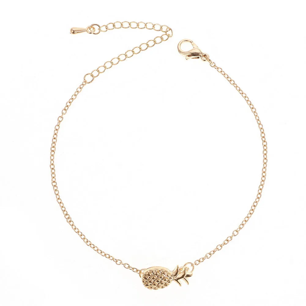 Gold tone and silver tone alloy pineapple bracelets for women on a white background.