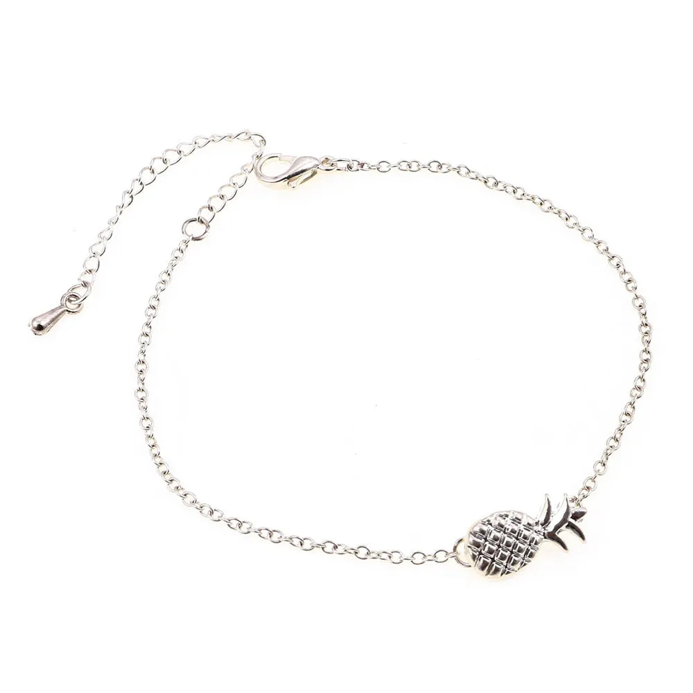 Gold tone and silver tone alloy pineapple bracelets for women on a white background.
