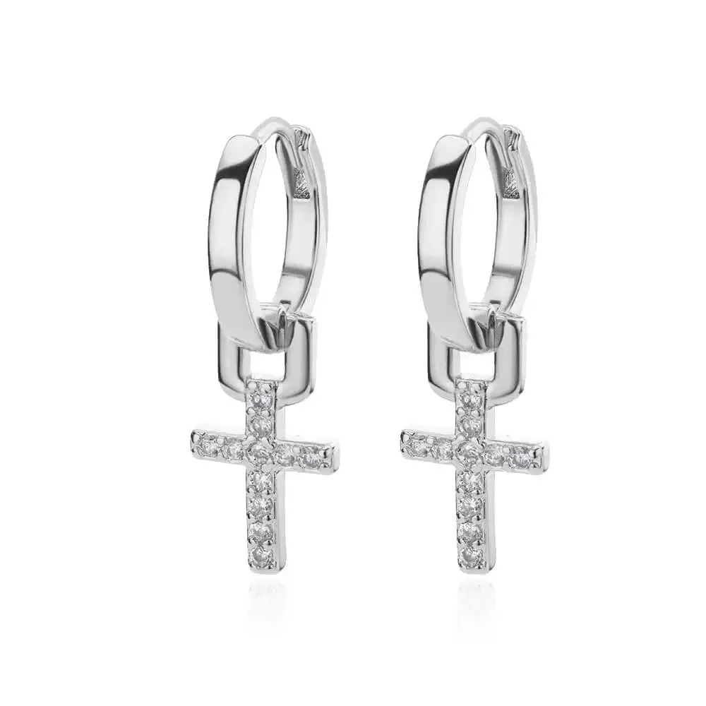 Cross stud earrings with 18K gold plating and clear zircon stone on a white background