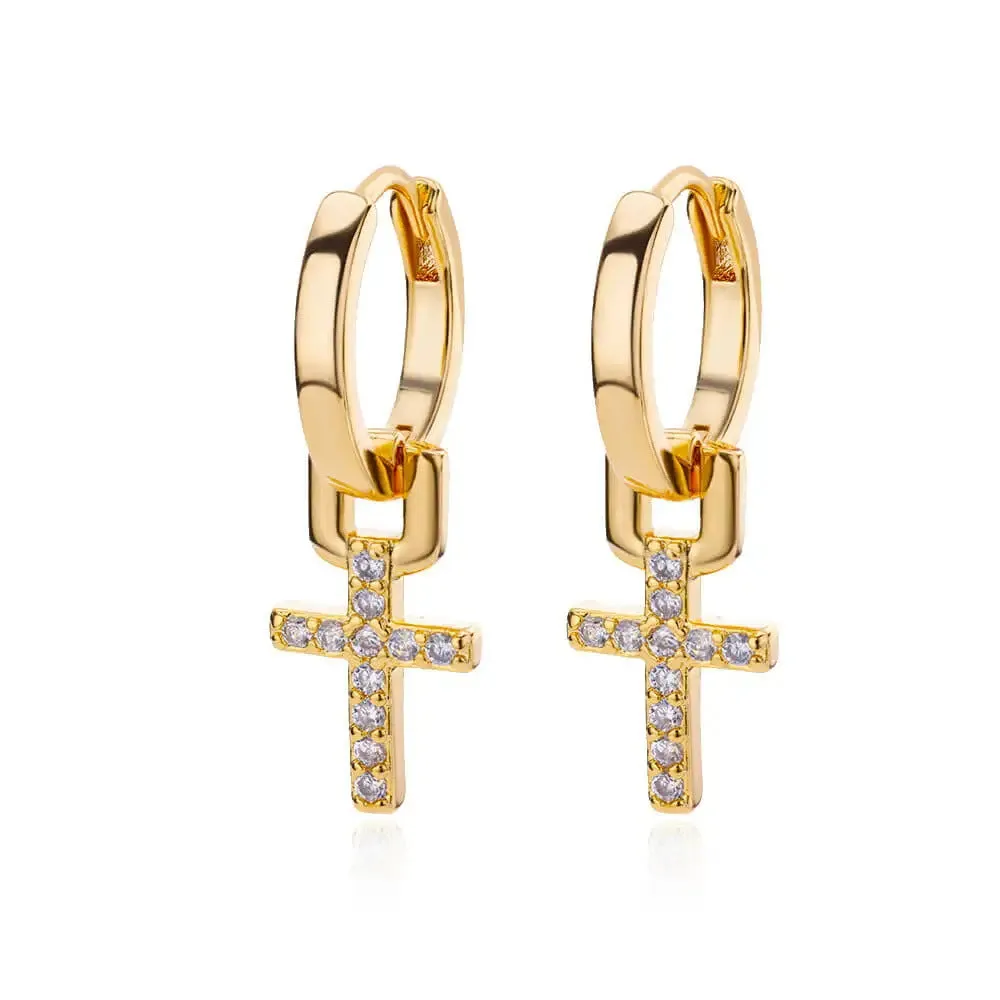Cross stud earrings with 18K gold plating and clear zircon stone on a white background