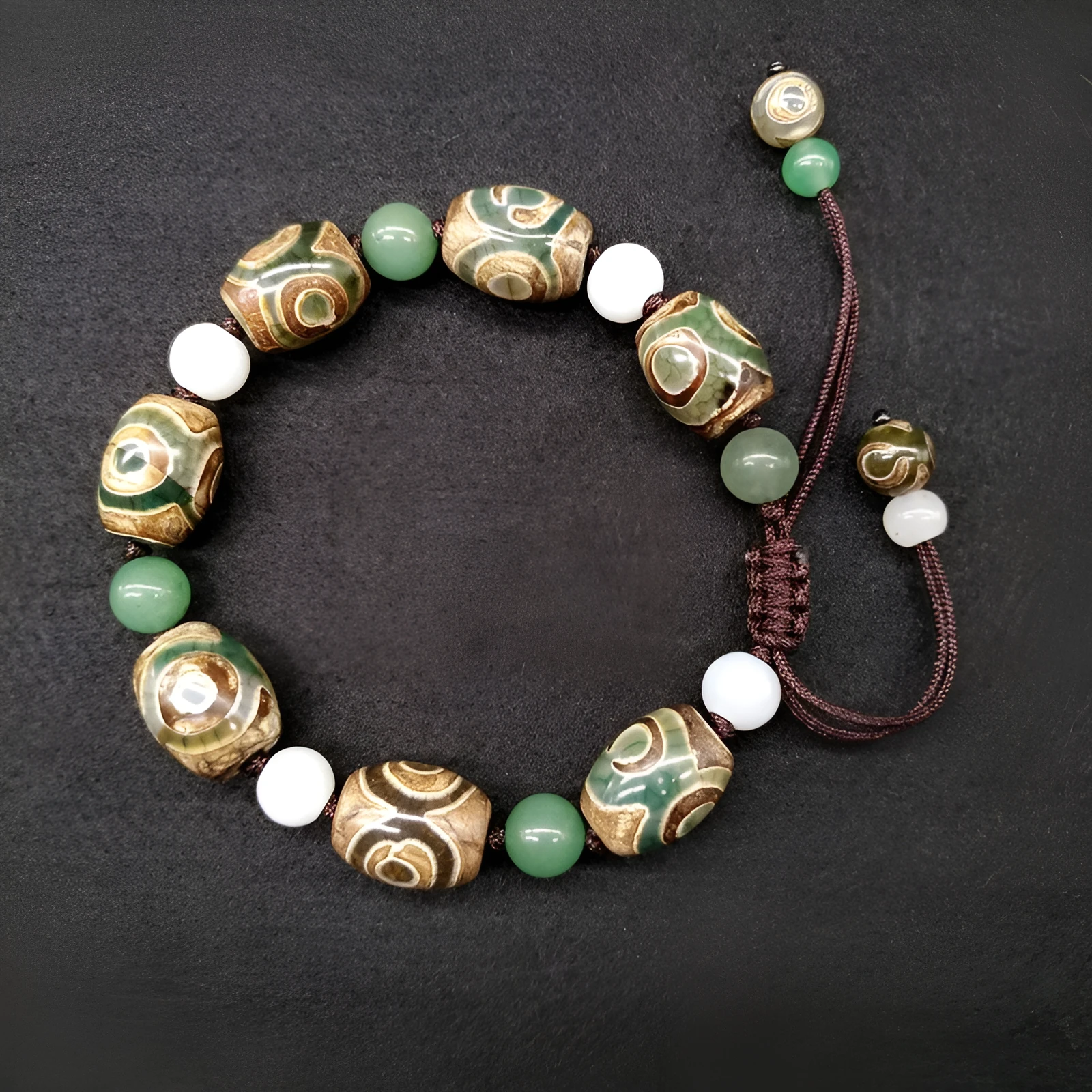 Green agate Tibetan beads bracelet with three-eye design and adjustable cord