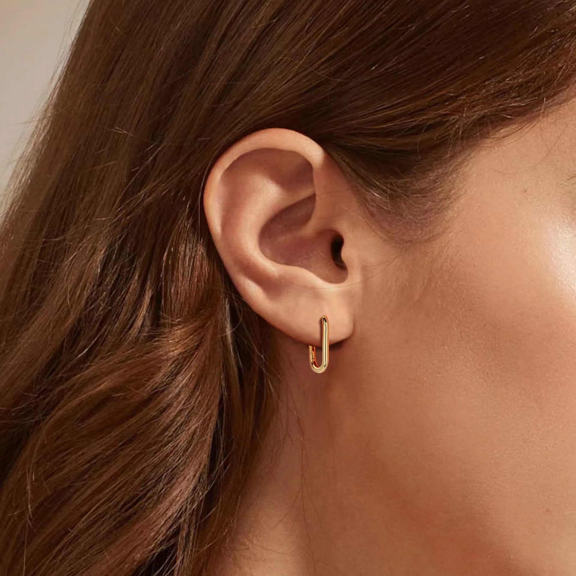 925 silver geometric earrings with gold plating oval quadrilateral shape on white background