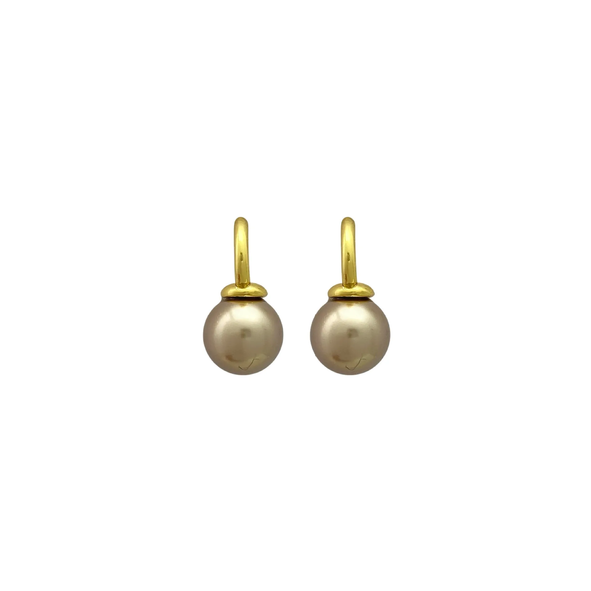 Vintage champagne pearl clip-on earrings with copper electroplated geometric design, on display as a pair