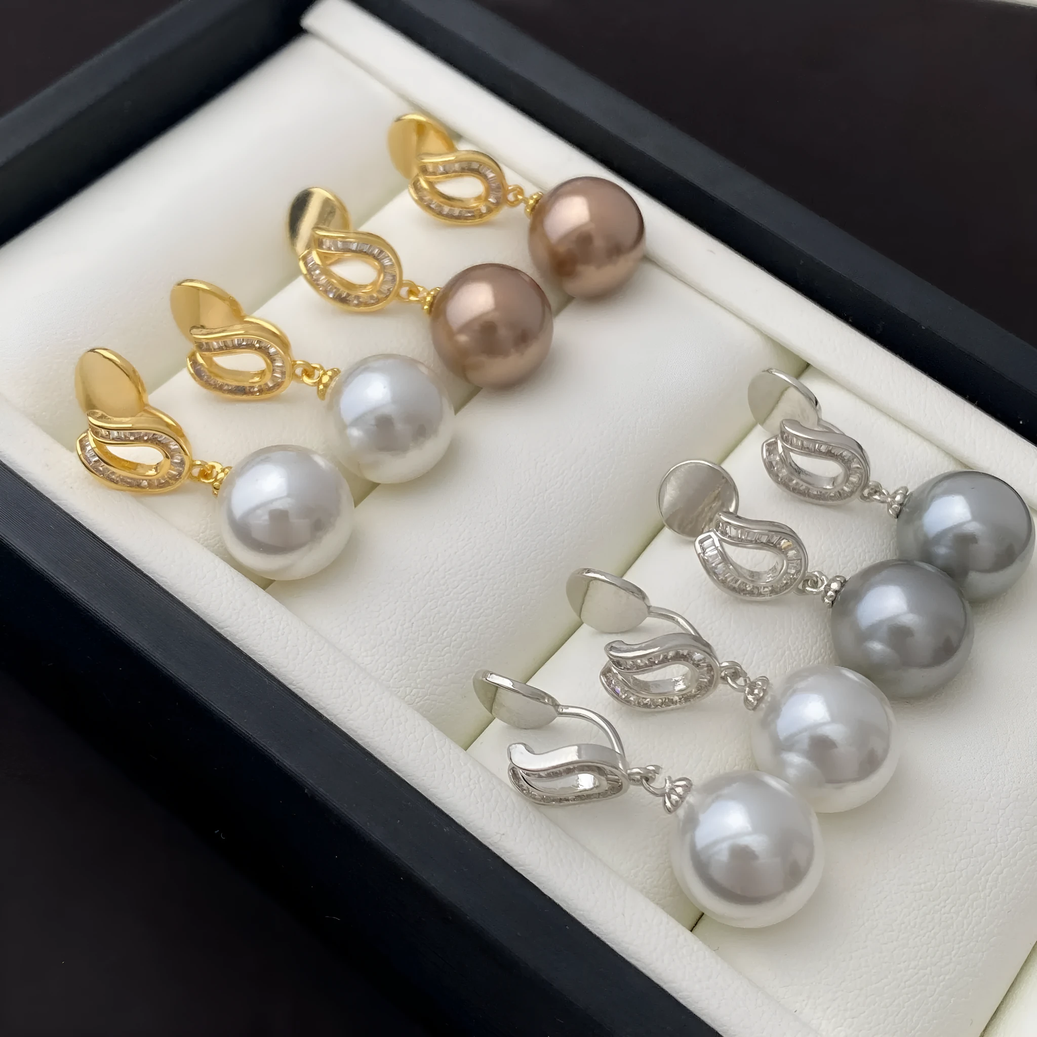 Geometric champagne pearl earrings with copper base and inlaid zircon, light luxury style, ear clip option