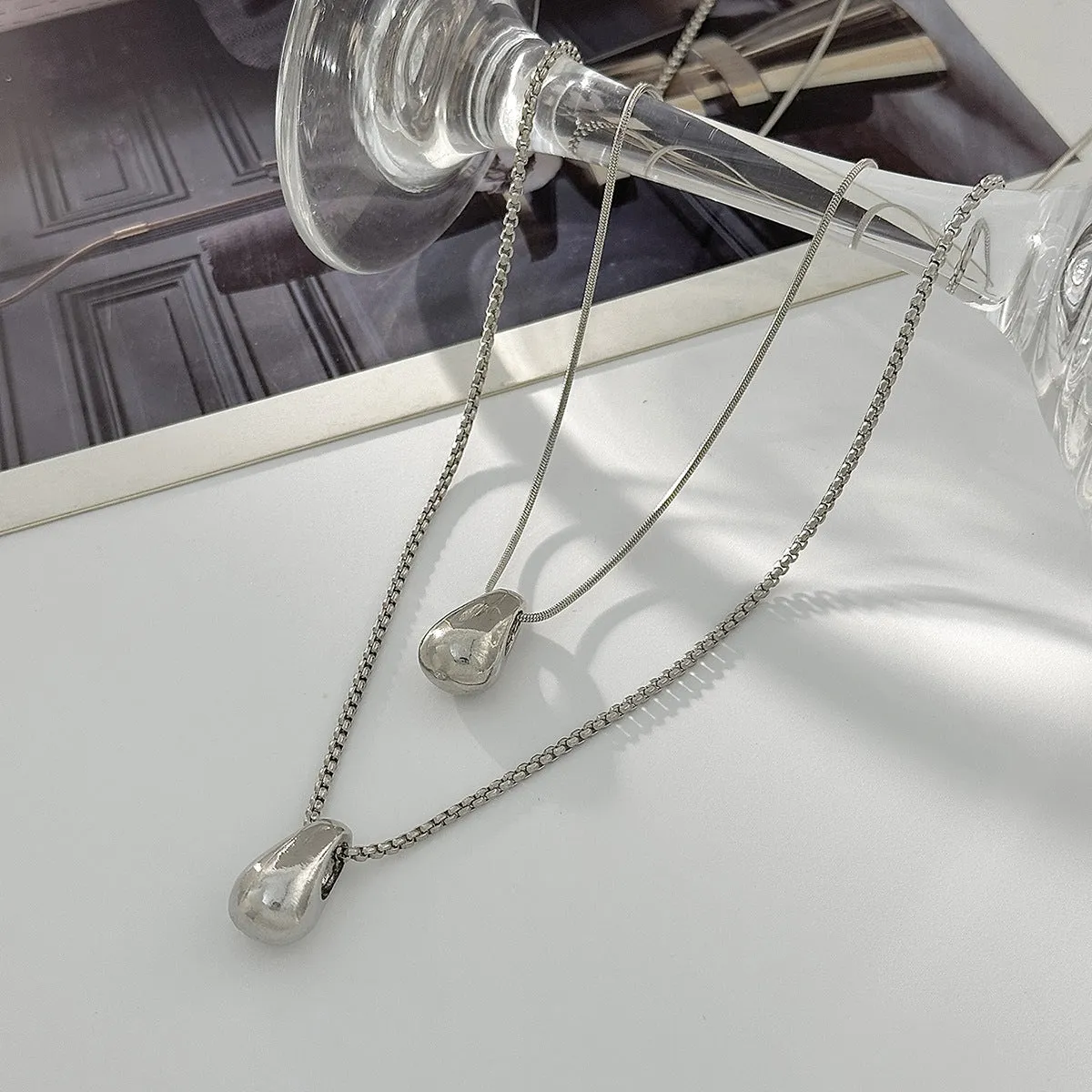Water drop geometric oval pendant necklace for women, gold electroplated finish, alloy and iron chain, 61-70cm circumference