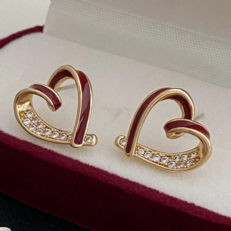 Micro-set zircon asymmetric heart earrings for women, copper base, white colour, ear clip style