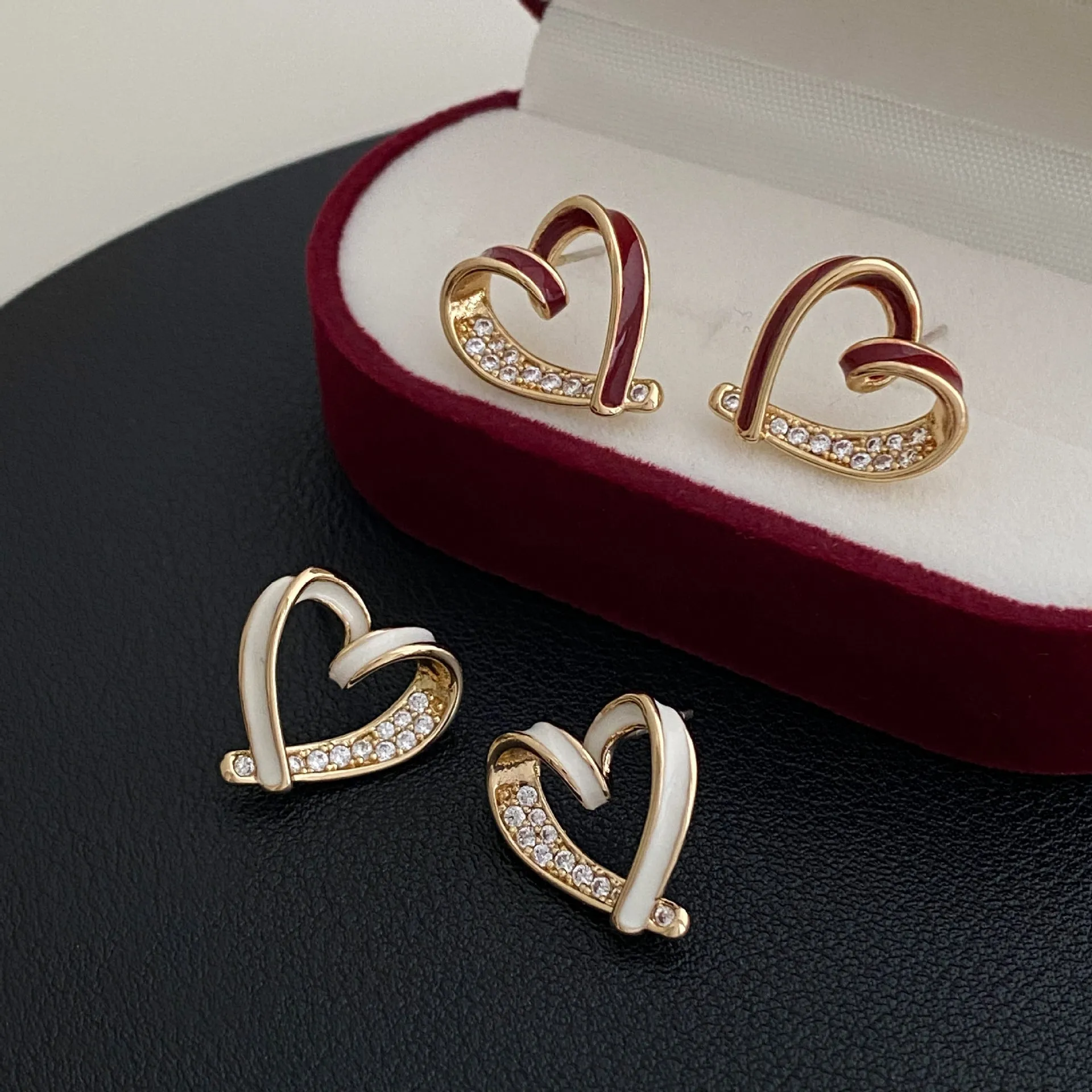 Micro-set zircon asymmetric heart earrings for women, copper base, white colour, ear clip style
