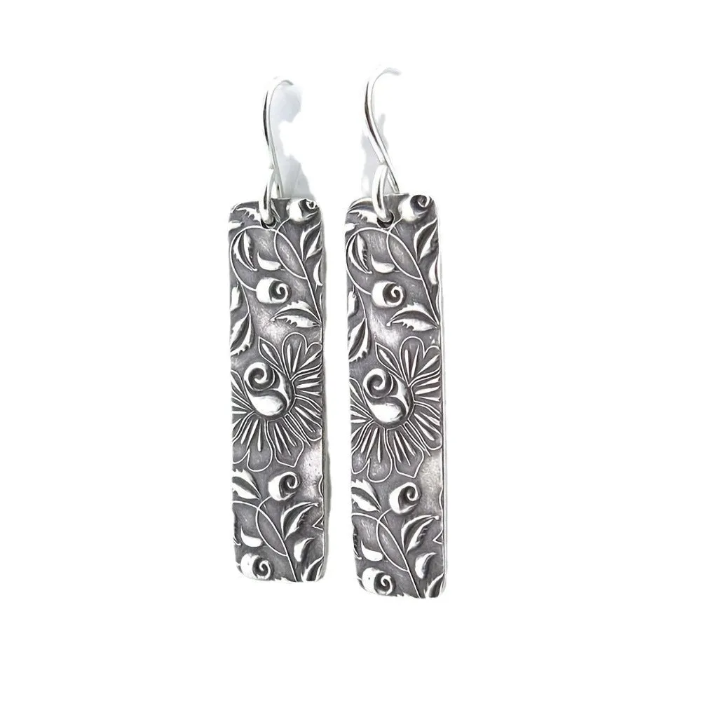 Long silver geometric earrings with carved vine design and retro European American style