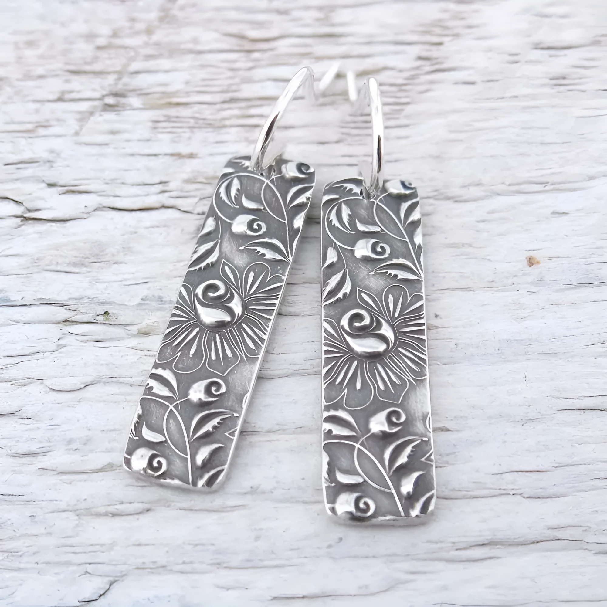 Long silver geometric earrings with carved vine design and retro European American style