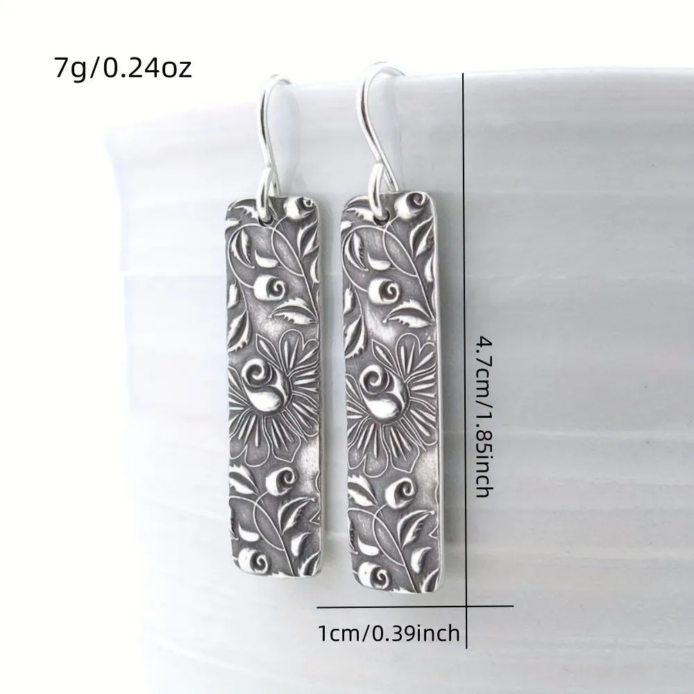 Long silver geometric earrings with carved vine design and retro European American style