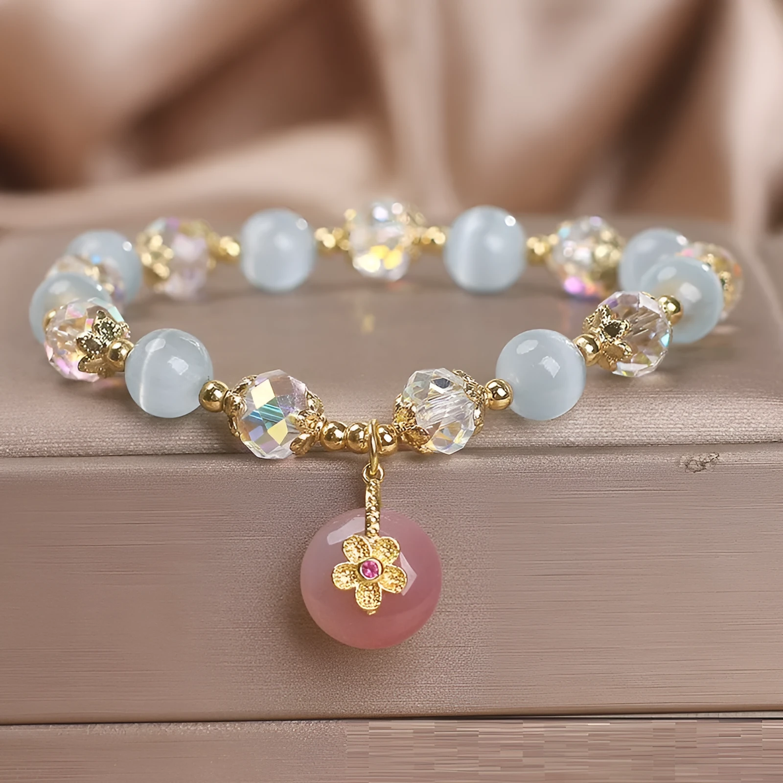 Chinese style sky blue opal peace buckle pendant bracelet for women on a flat surface