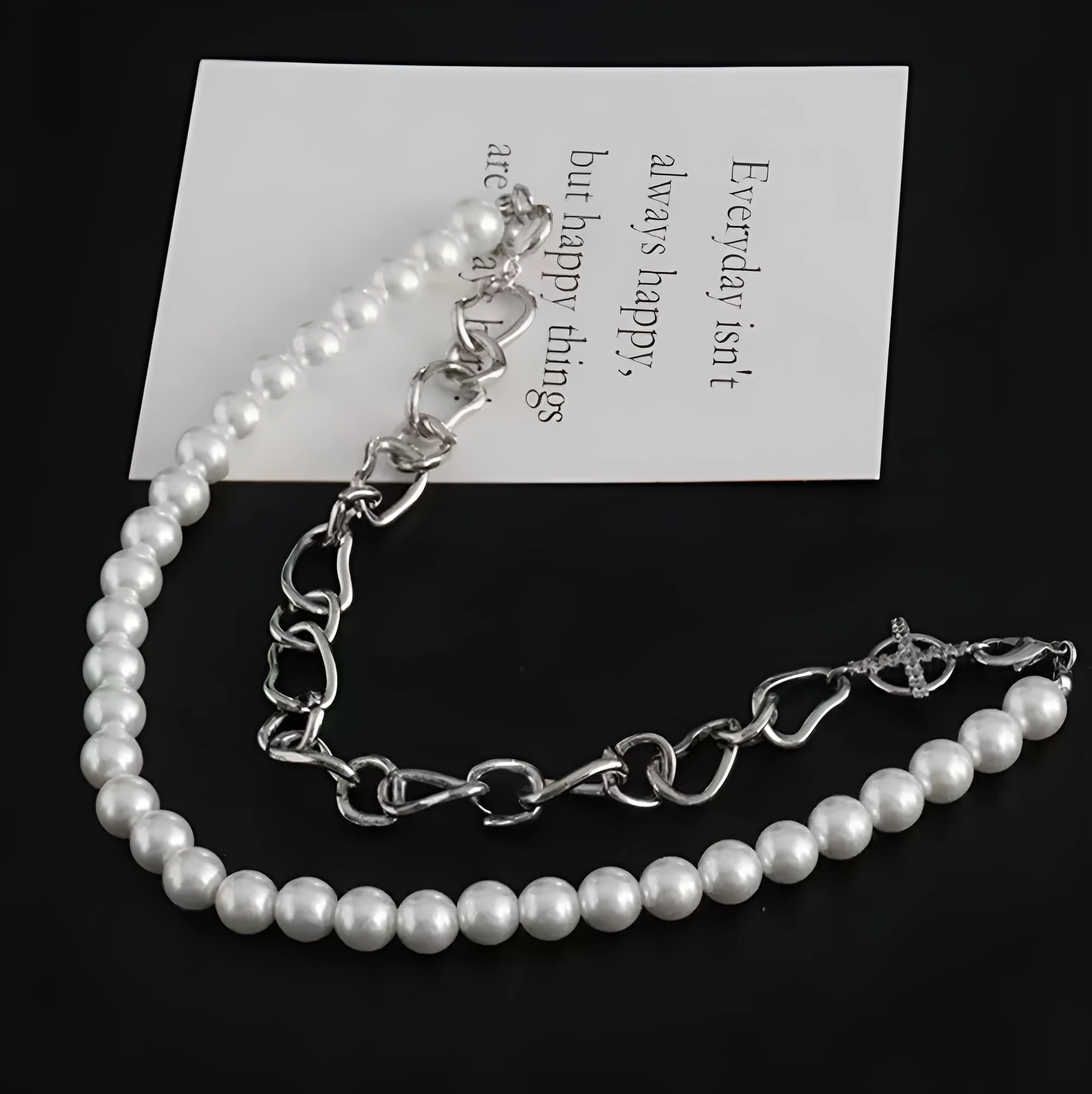 White geometric acrylic clavicle chain necklace with twisted chain and asymmetric design