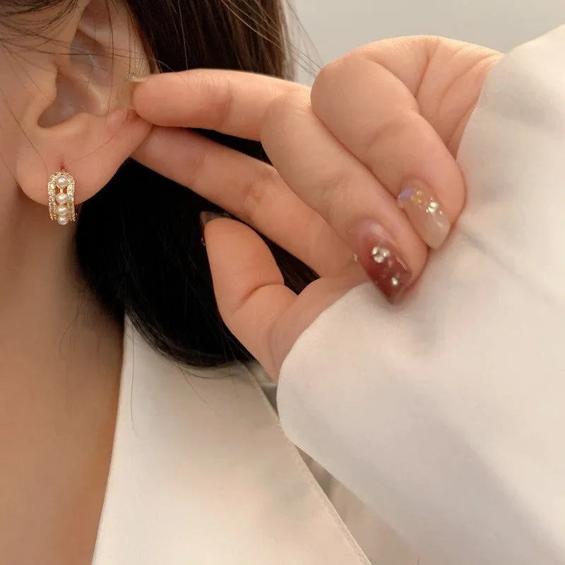 Light luxury French pearl earrings in platinum colour, copper geometric double ring with help diamond, micro inlay finish