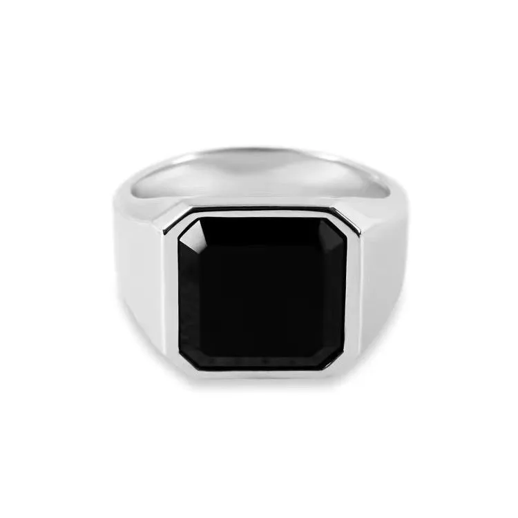 Titanium steel hexagonal men's ring with glossy black epoxy inlay on white background