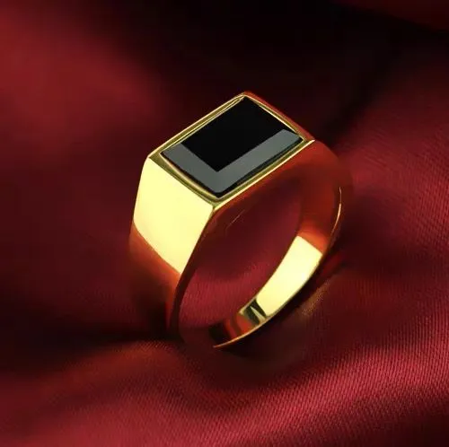 Titanium steel hexagonal men's ring with glossy black epoxy inlay on white background