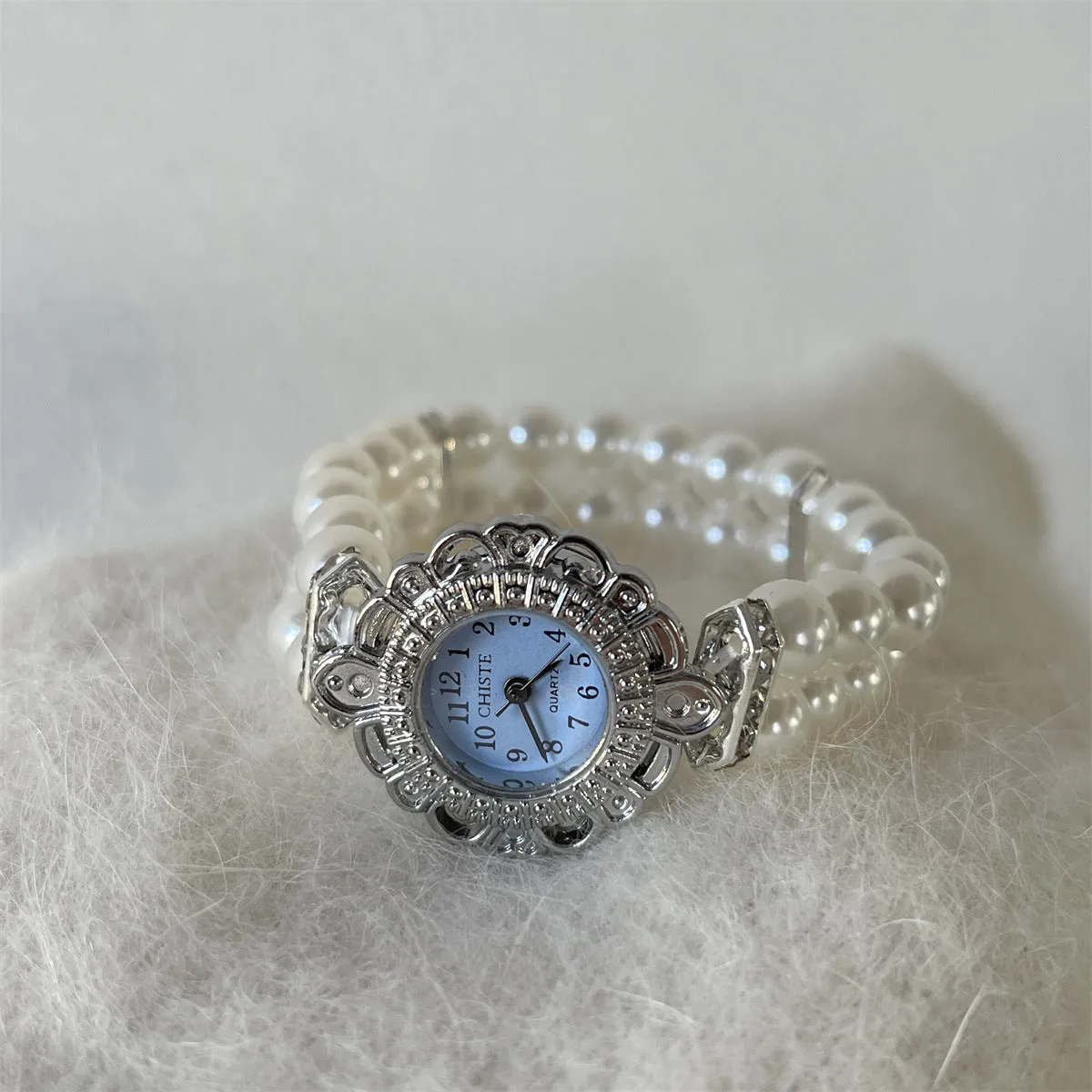 Women's quartz pearl bracelet watch with alloy case and glass mirror face