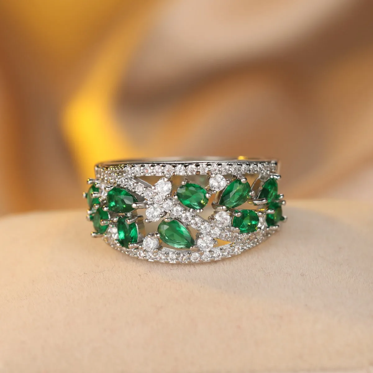 Women's round hollow fashion ring in copper with a choice of gemstone colours on a size chart.