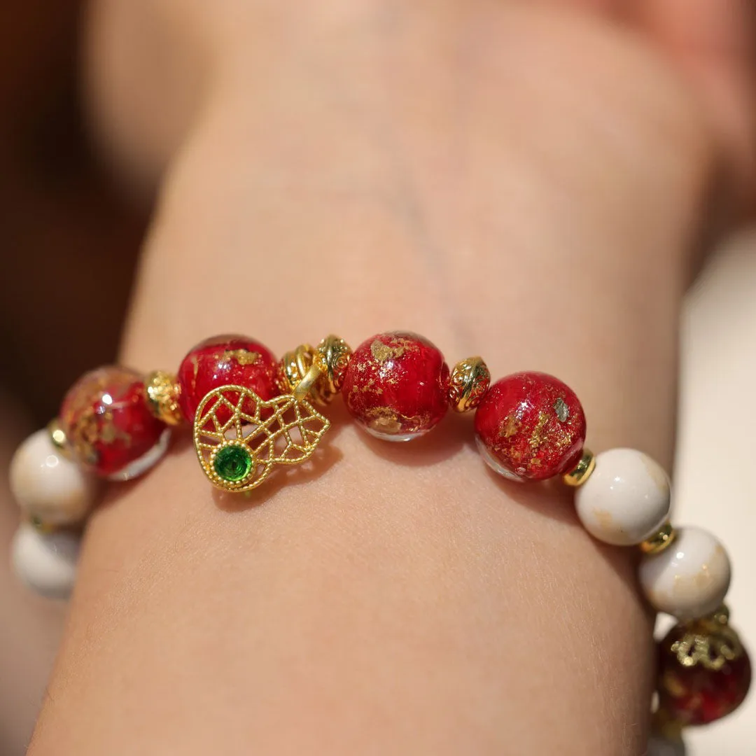 Women's ethnic bracelet with gold foil coloured glaze and geometric design