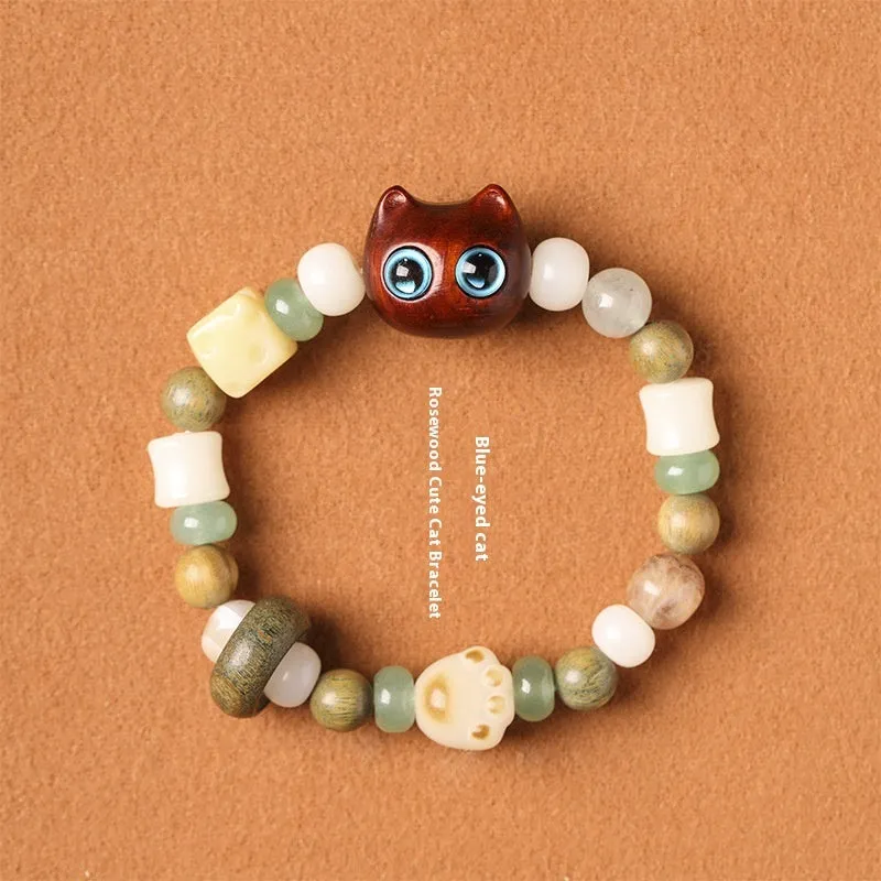Hand-woven beaded bracelet with a cat's paw charm, jade, and wood beads in a cartoon style.