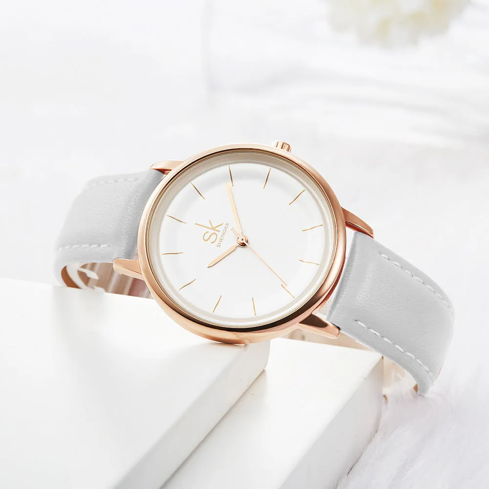 Rose gold alloy case women's quartz watch with white PU strap and round 38mm dial