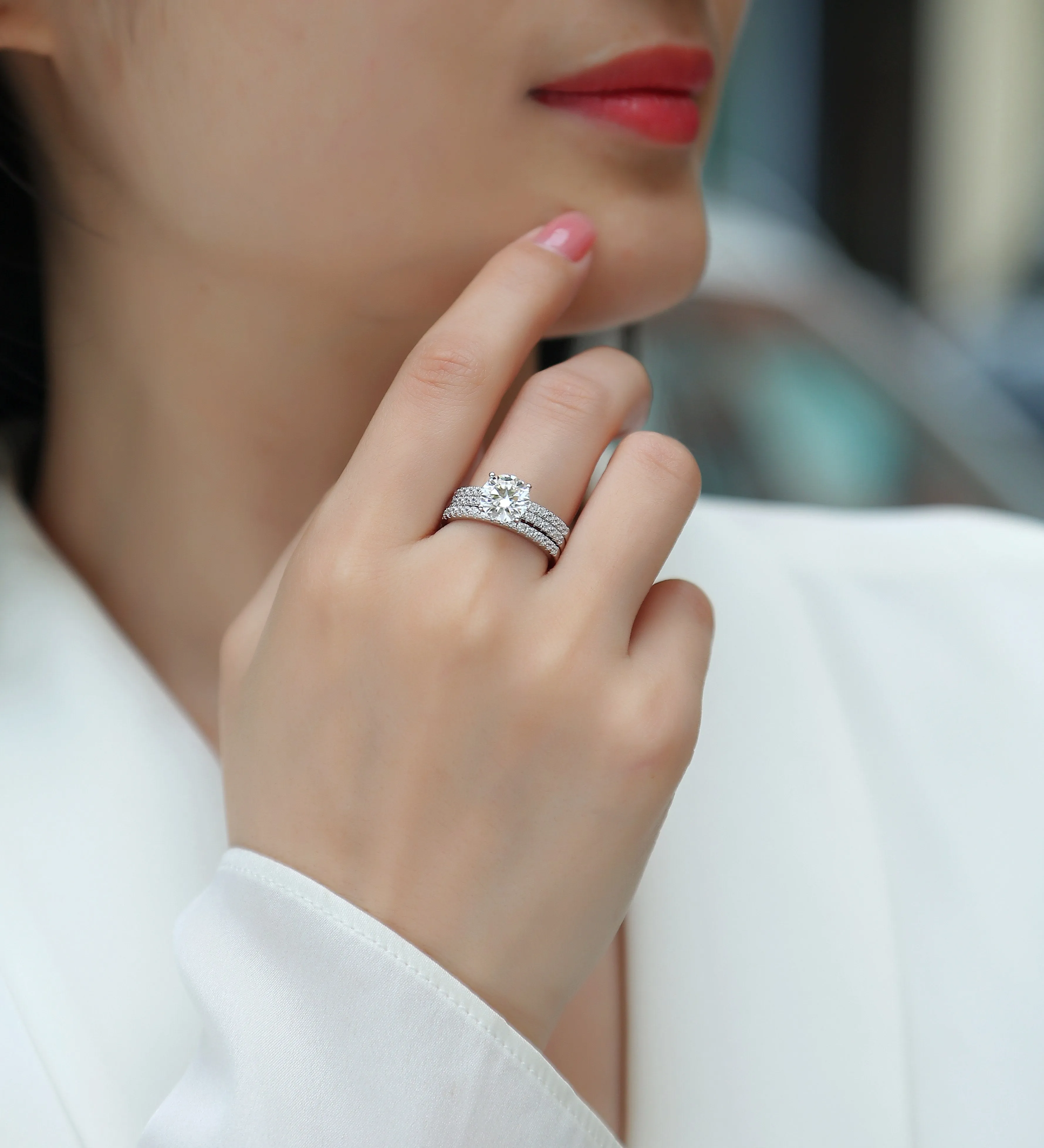 Dreamy 2-carat moissanite wedding ring set on white background, S925 silver platinum-plated band