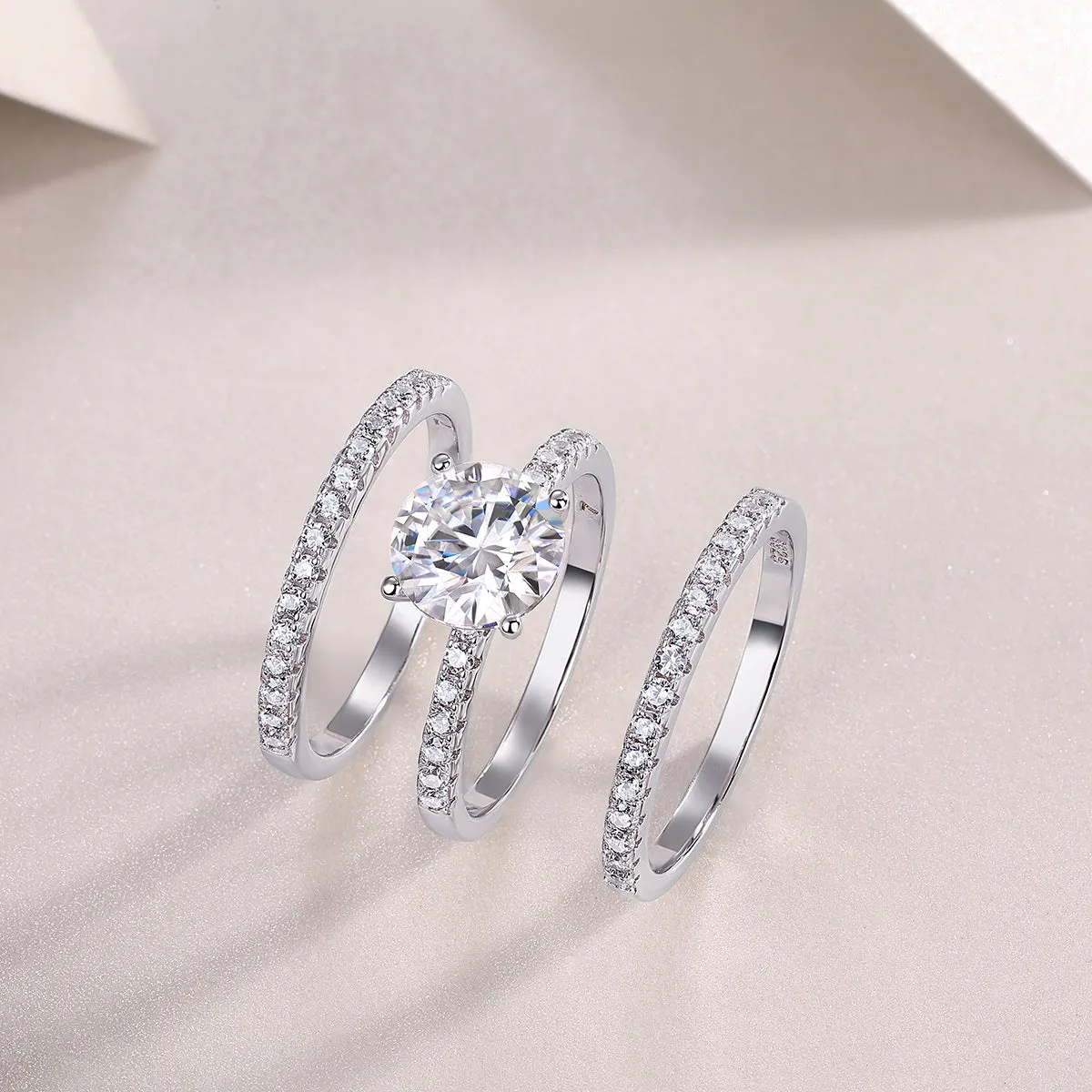 Dreamy 2-carat moissanite wedding ring set on white background, S925 silver platinum-plated band