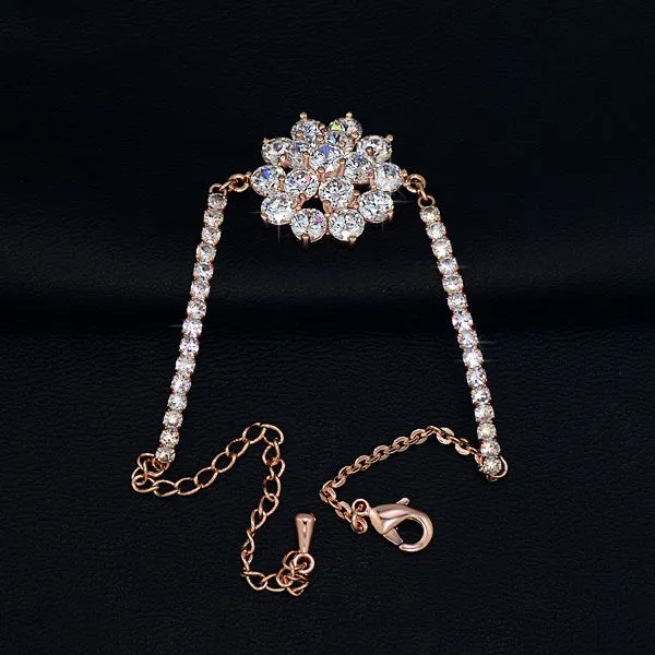 Rose gold cubic zirconia bracelet with cross crown Roman numeral motifs on alloy setting
