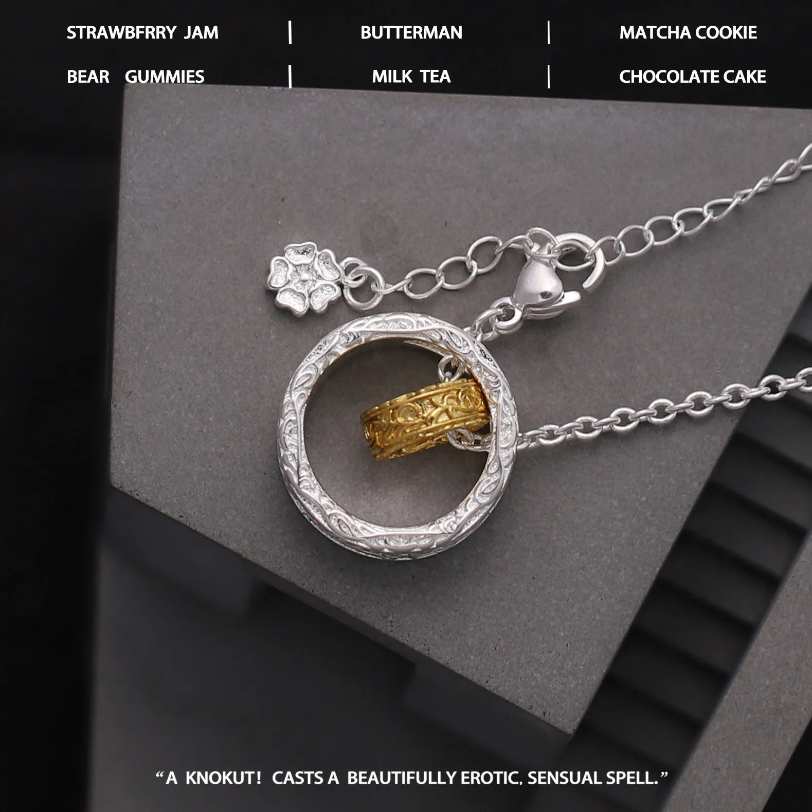 Geometric copper nested necklace with gold and silver electroplated finish, round and ring elements, on display