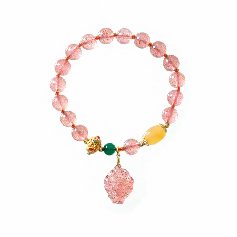 Polished crystal strawberry quartz beaded bracelet in a Nine Tail Fox style for women.