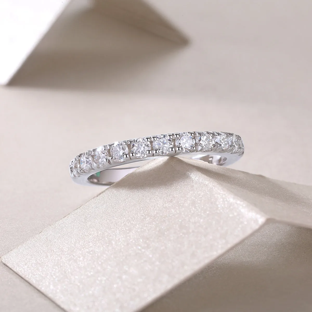 Parallel World moissanite wedding ring set in gold, S925 silver with platinum plating, on white background