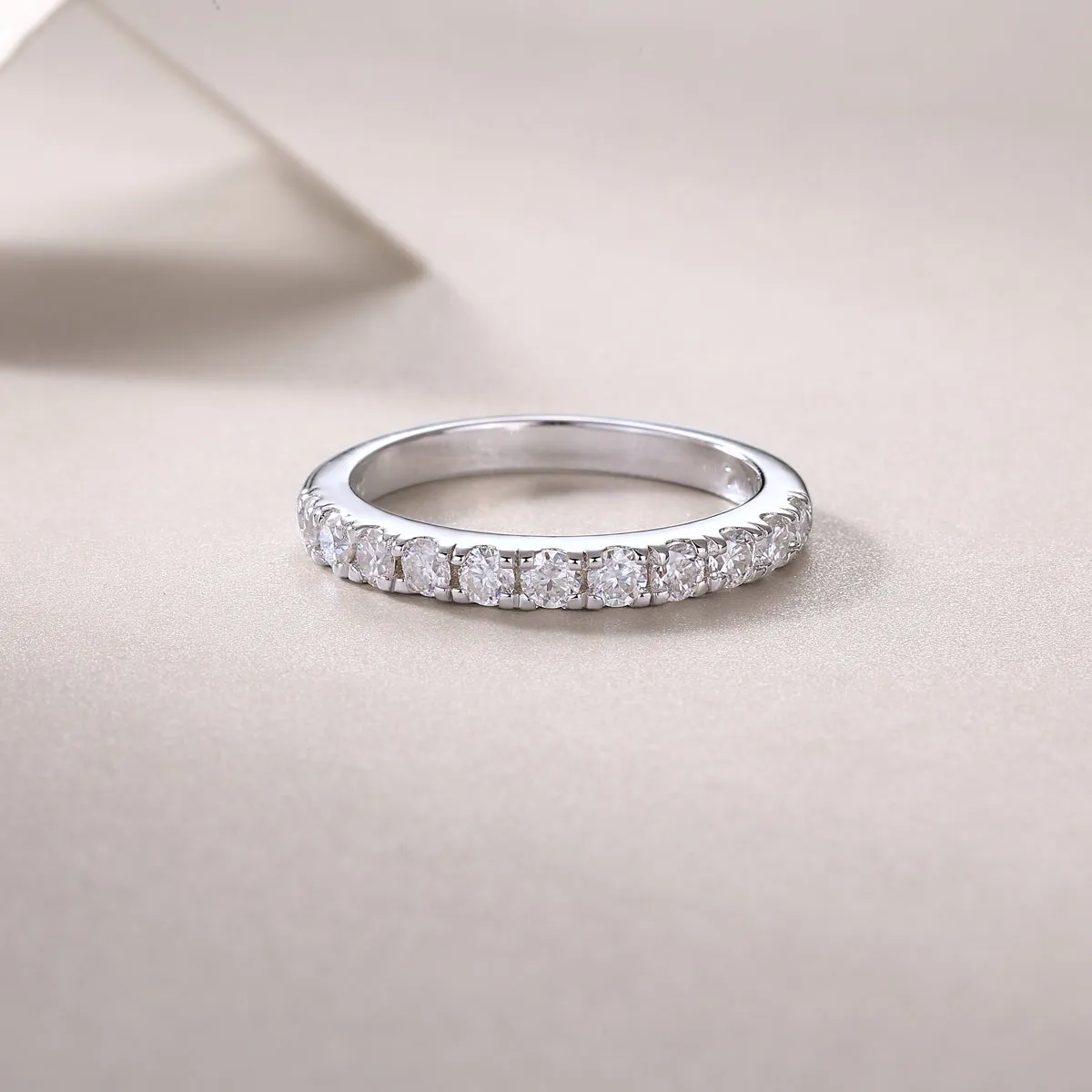 Parallel World moissanite wedding ring set in gold, S925 silver with platinum plating, on white background