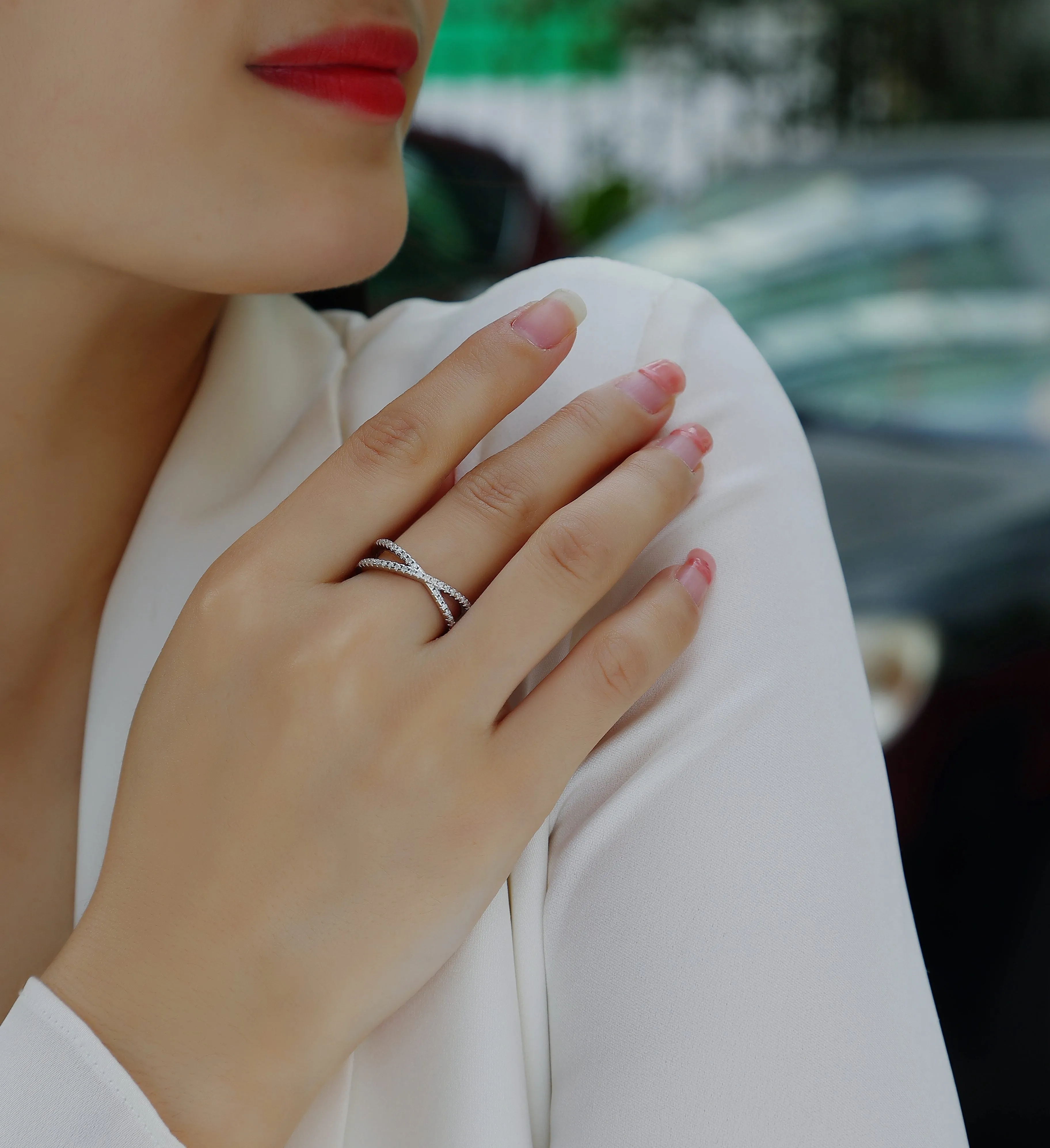 Love Interwoven moissanite wedding ring set in gold finish, S925 silver platinum plated, on white background with gift box.