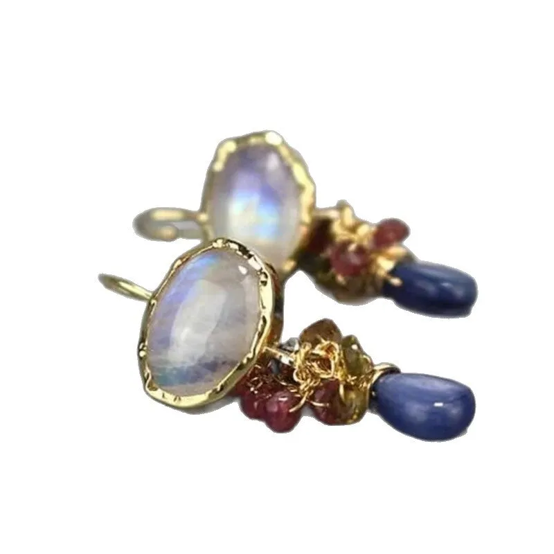 Retro vertical earrings with colored stones in geometric copper design, micro-set style