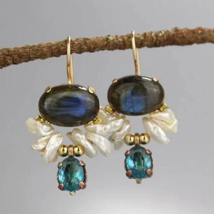 Retro vertical earrings with colored stones in geometric copper design, micro-set style