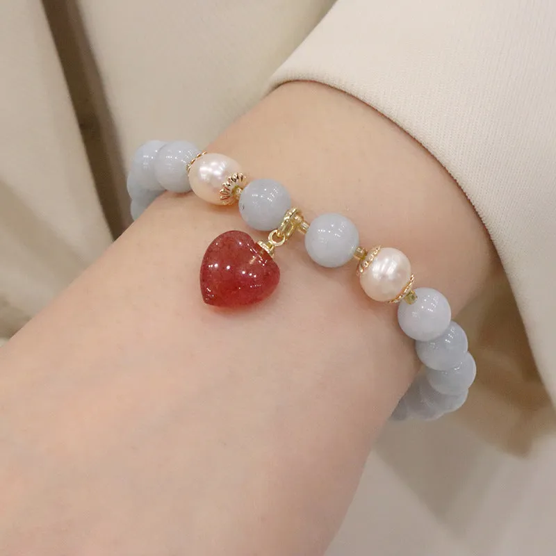 Women's gold-plated bracelet with artificial crystal and chalcedony pendant in climbing cat design