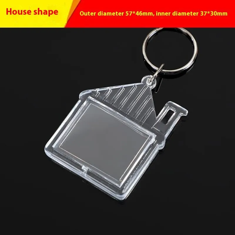 Transparent acrylic empty keychain shell in apple shape against a white background