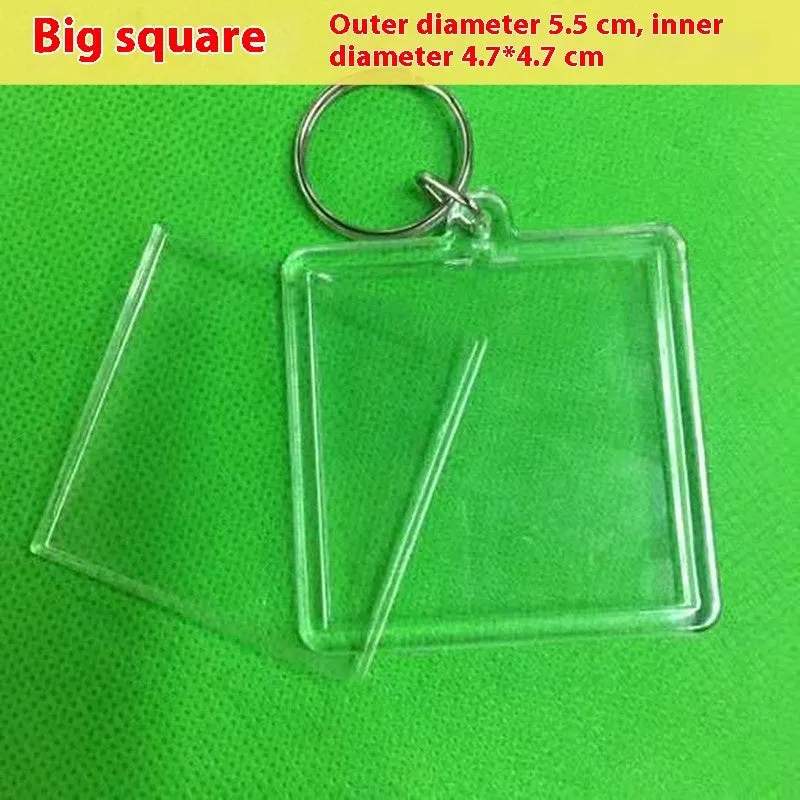 Transparent acrylic empty keychain shell in apple shape against a white background