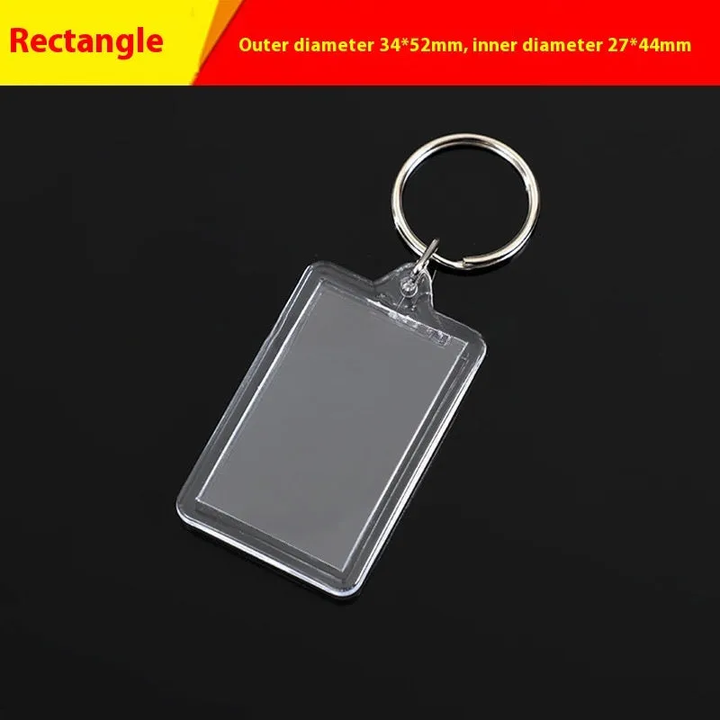 Transparent acrylic empty keychain shell in apple shape against a white background