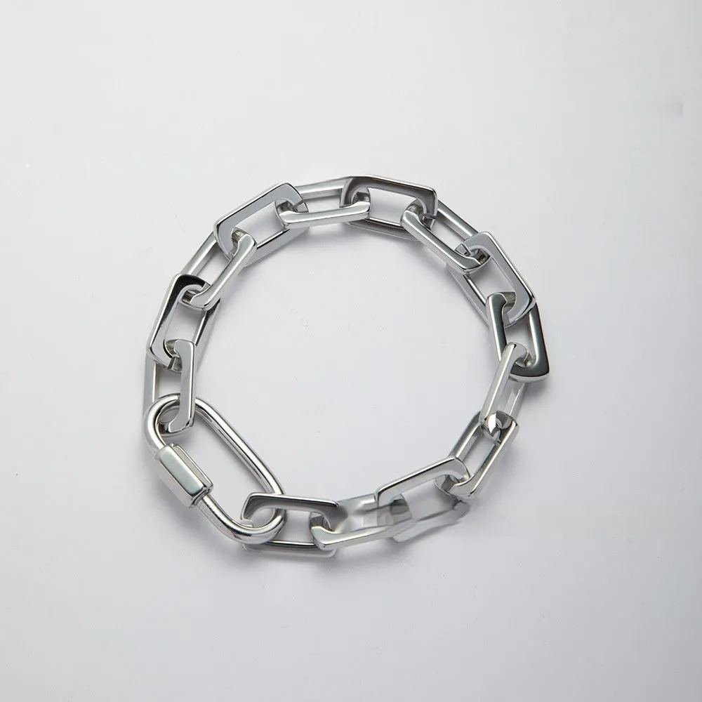 Women's titanium steel carabiner bracelet with ellipse design in gold or silver electroplated finish