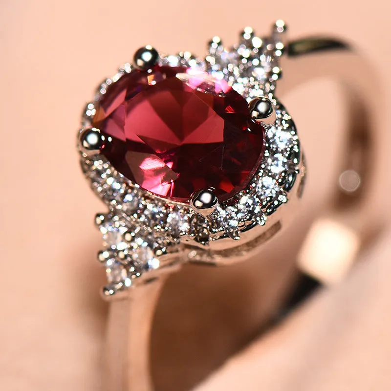 Oval ruby colour copper ring with adjustable open mouth design and white gold tone finish