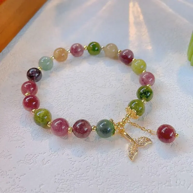 Pink crystal women's bracelet with geometric shape and electroplated finish in colour option selection.