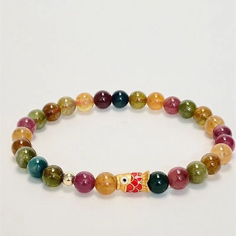 Pink crystal women's bracelet with geometric shape and electroplated finish in colour option selection.