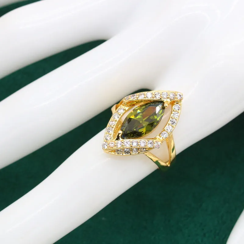 Olive green anti-allergy AAA zircon jewellery set with necklace, ring, bracelet, and earrings on display