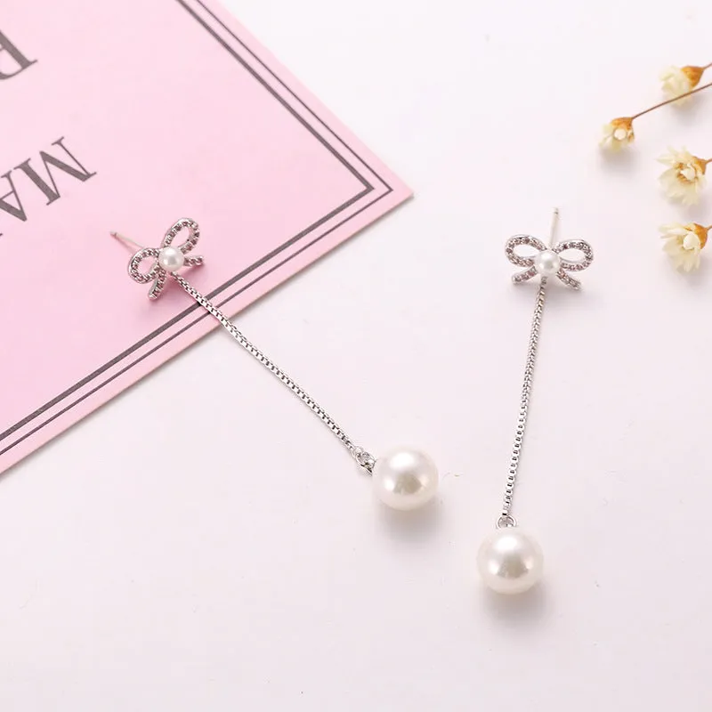 Sterling silver bow earrings with long pearl pendant, hypoallergenic copper construction, women's two-way style