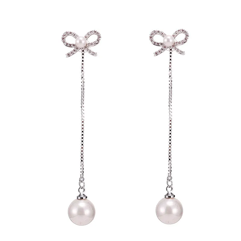 Sterling silver bow earrings with long pearl pendant, hypoallergenic copper construction, women's two-way style