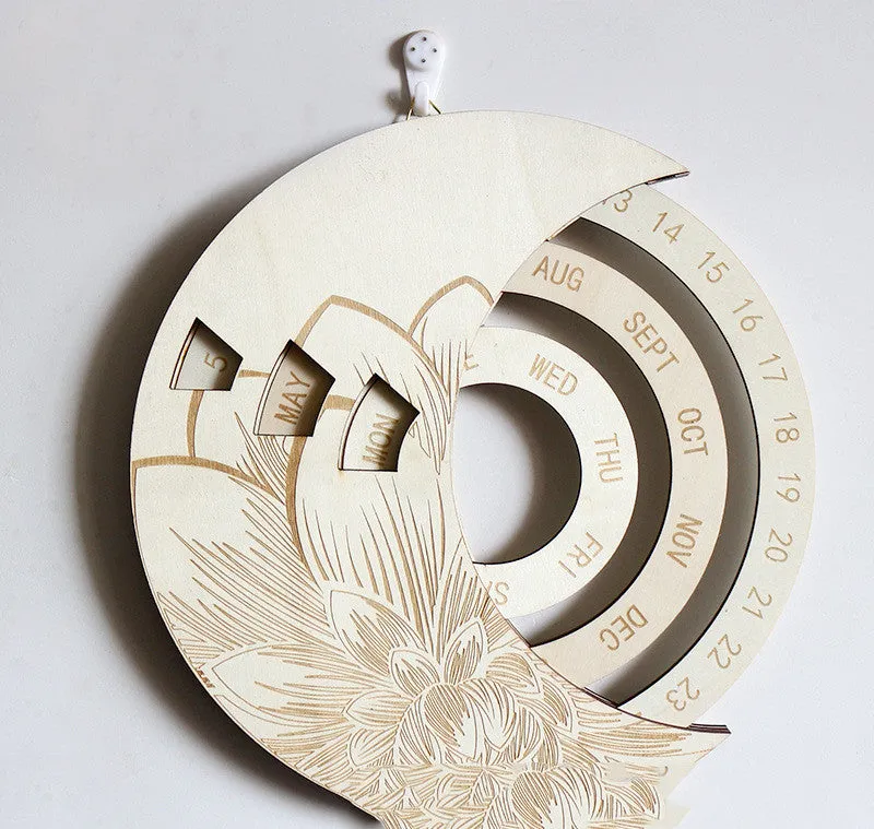 Round wooden perpetual wall calendar in basswood with polished finish, available in multiple colours