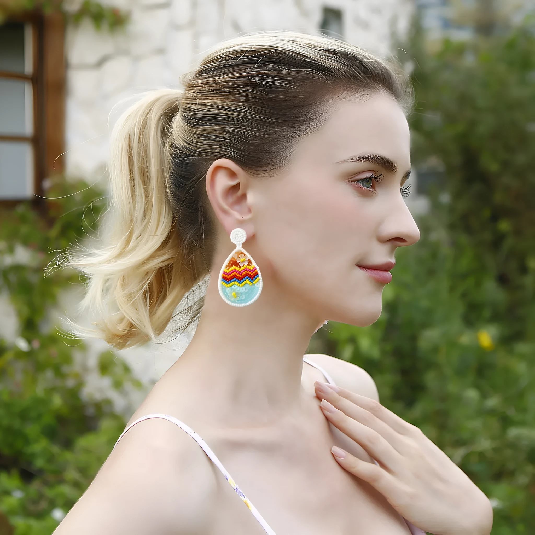 Hand-woven beaded drop earrings in geometric Easter egg shape, colour E69066, 6.7cm by 3.7cm